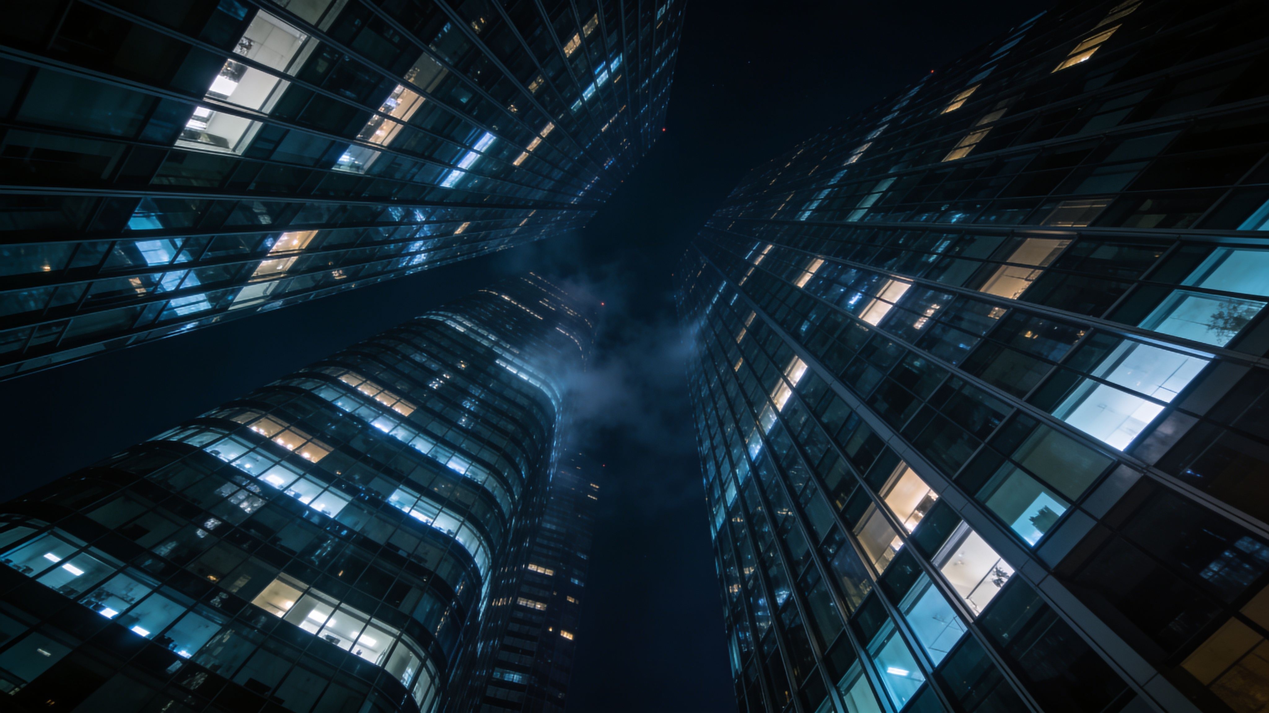 Glass towers rising into the night sky